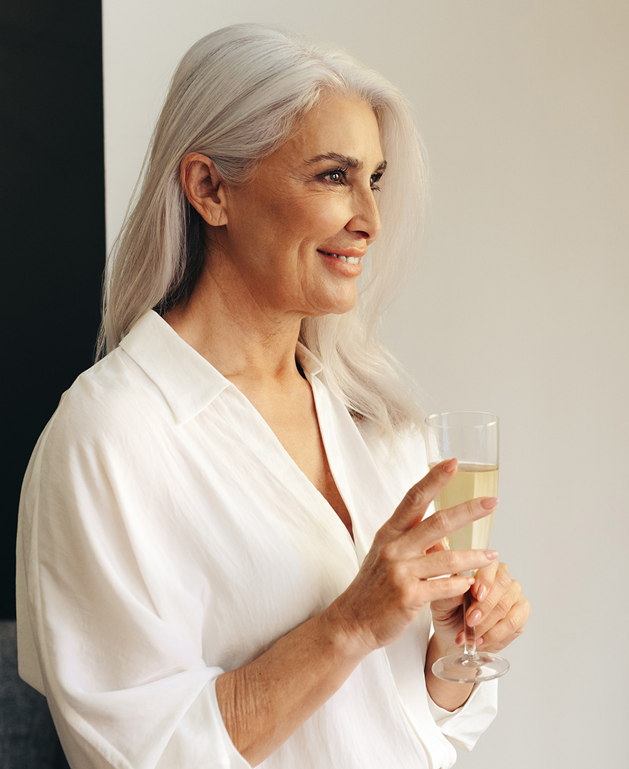 Mature woman holding a glass