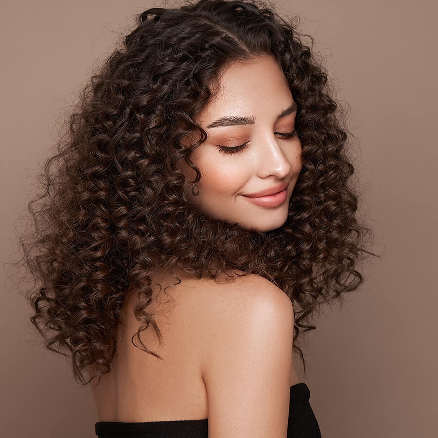 Beautiful woman with curly hair