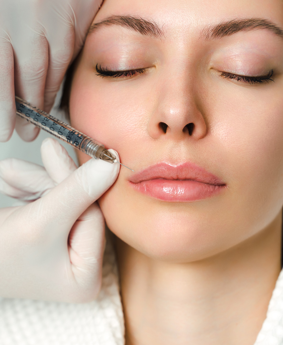 Woman getting a lip injection